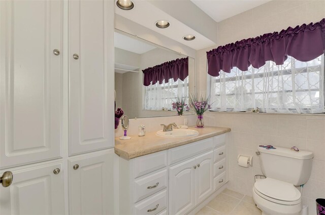 74 Windsor Dr, Englewood, FL 34223 - bathroom featuring vanity and tile patterned flooring