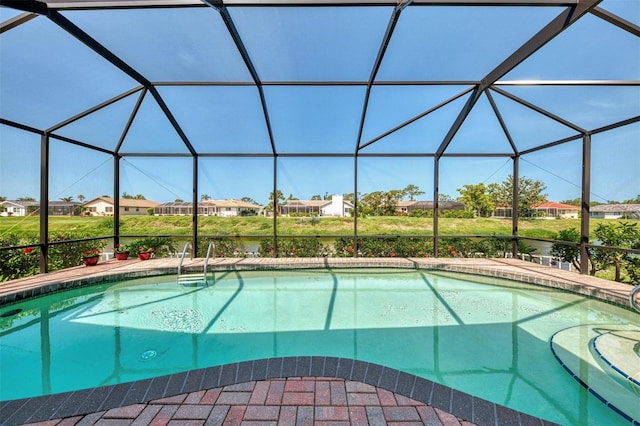 74 Windsor Dr, Englewood, FL 34223 - swimming pool with a residential view and glass enclosure