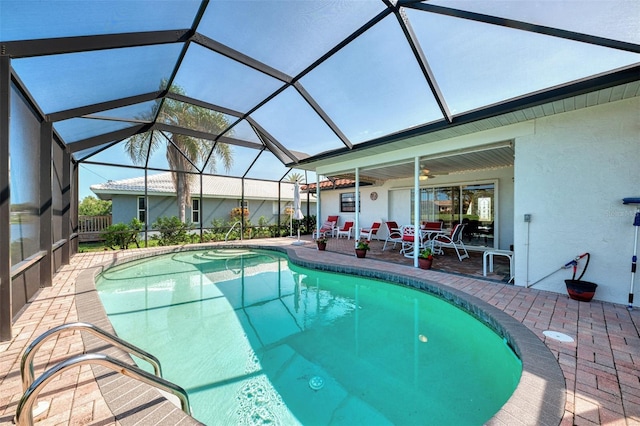 74 Windsor Dr, Englewood, FL 34223 - swimming pool featuring a patio, a ceiling fan, and glass enclosure