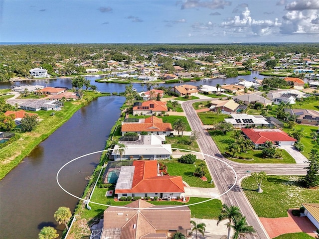 74 Windsor Dr, Englewood, FL 34223 - aerial perspective of suburban area featuring a nearby body of water