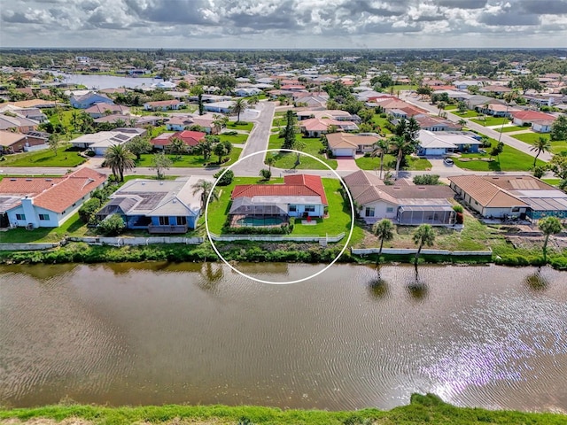 74 Windsor Dr, Englewood, FL 34223 - aerial perspective of suburban area with a nearby body of water