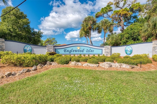 74 Windsor Dr, Englewood, FL 34223 - community sign with a yard