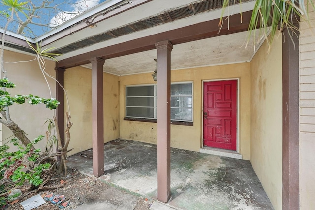 9300 Gulf Blvd, St Pete Beach, FL 33706 - entrance to property featuring stucco siding