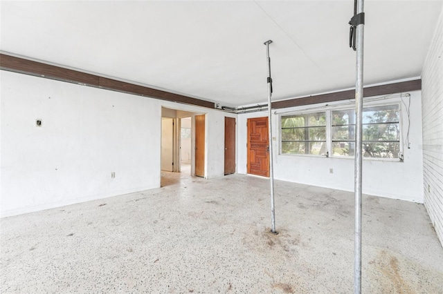 9300 Gulf Blvd, St Pete Beach, FL 33706 - unfurnished living room with a garage