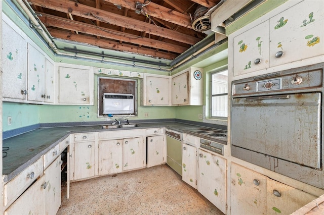 9300 Gulf Blvd, St Pete Beach, FL 33706 - kitchen with oven, dishwasher, a sink, and dark countertops