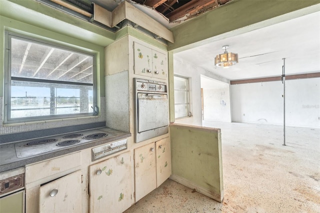 9300 Gulf Blvd, St Pete Beach, FL 33706 - kitchen with wall oven and electric cooktop