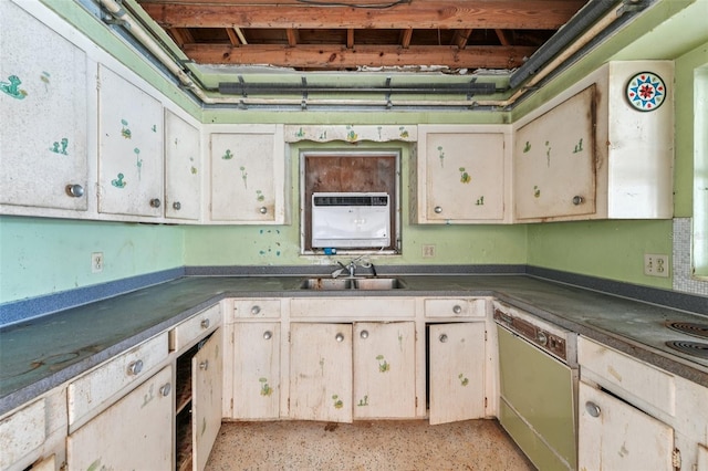 9300 Gulf Blvd, St Pete Beach, FL 33706 - kitchen with dishwasher, a sink, and dark countertops