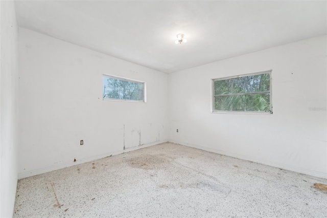 9300 Gulf Blvd, St Pete Beach, FL 33706 - empty room featuring speckled floor