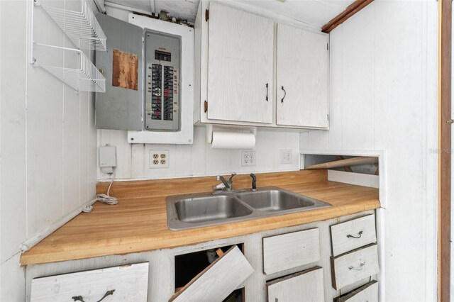 9300 Gulf Blvd, St Pete Beach, FL 33706 - kitchen with a sink, light countertops, and electric panel