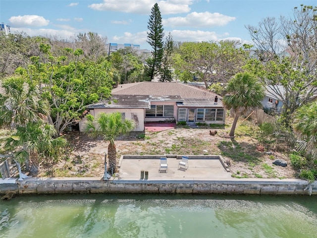 9300 Gulf Blvd, St Pete Beach, FL 33706 - back of house with a patio and a water view
