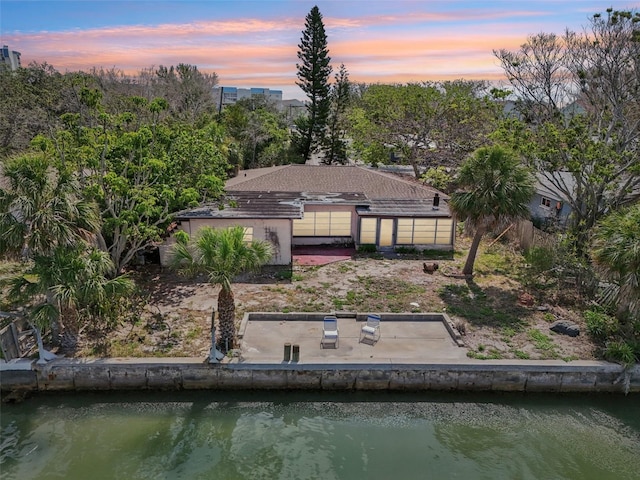 9300 Gulf Blvd, St Pete Beach, FL 33706 - back of house with a patio and a water view