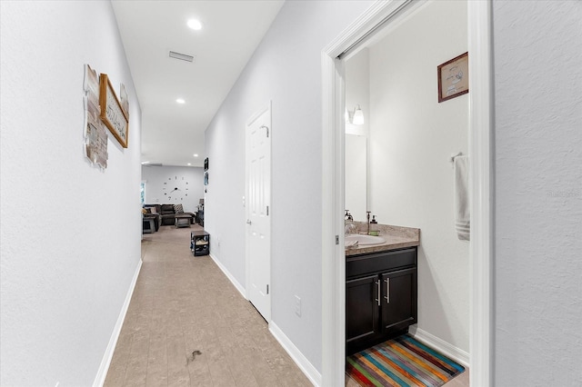 4644 Vignette Way, Sarasota, FL 34240 - hall with light wood-style flooring and recessed lighting