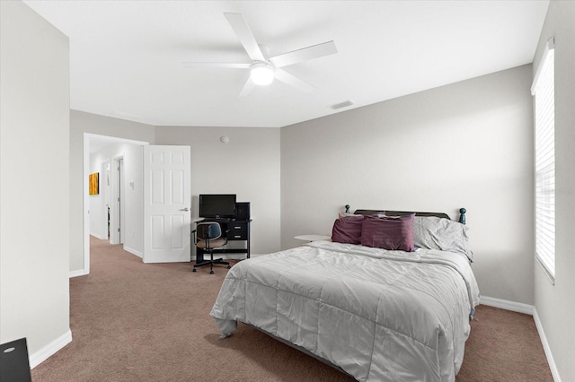 4644 Vignette Way, Sarasota, FL 34240 - bedroom with carpet flooring, multiple windows, and a ceiling fan