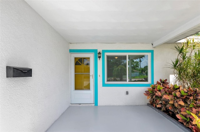 320 59th St W, Bradenton, FL 34209 - property entrance with stucco siding