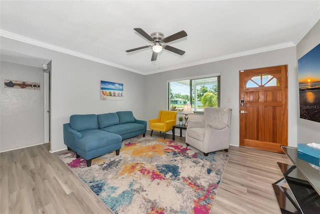 320 59th St W, Bradenton, FL 34209 - living room featuring wood finished floors, a ceiling fan, and ornamental molding