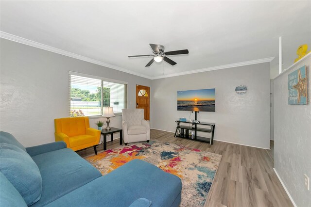 320 59th St W, Bradenton, FL 34209 - living area featuring crown molding, ceiling fan, wood finished floors, and baseboards
