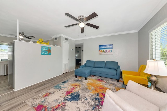 320 59th St W, Bradenton, FL 34209 - living room featuring a ceiling fan, wood finished floors, and ornamental molding