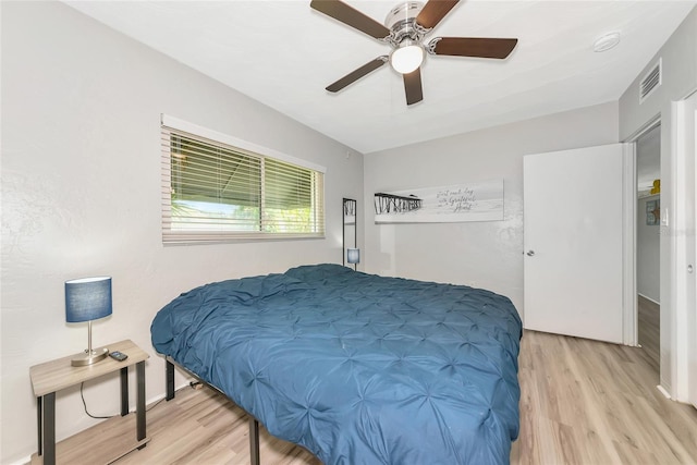 320 59th St W, Bradenton, FL 34209 - bedroom featuring light wood-style flooring and a ceiling fan