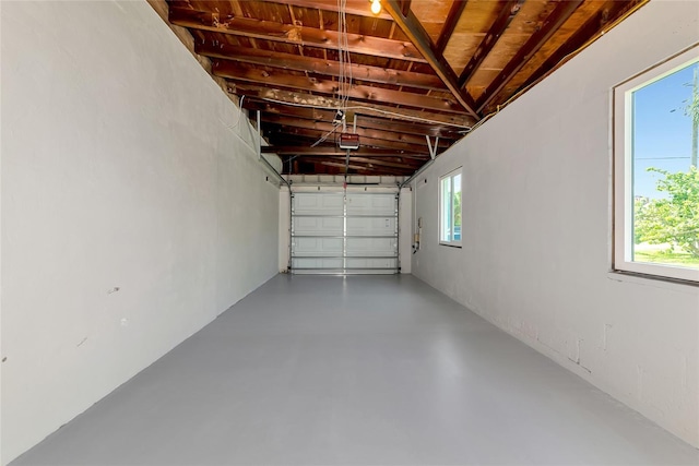 320 59th St W, Bradenton, FL 34209 - garage featuring a garage door opener