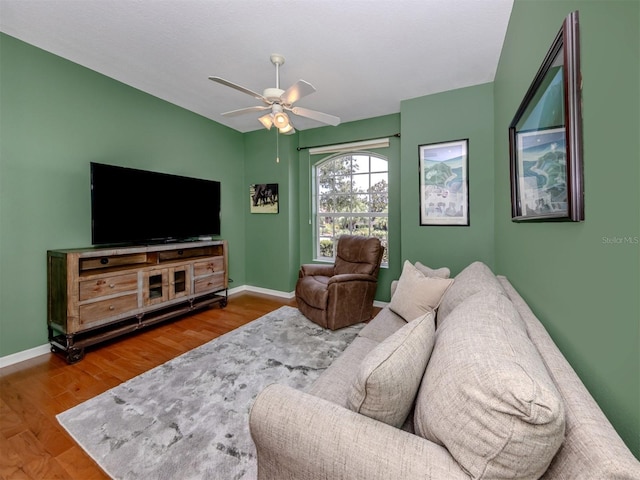673 Crane Prairie Way, Osprey, FL 34229 - living room with a ceiling fan and wood finished floors