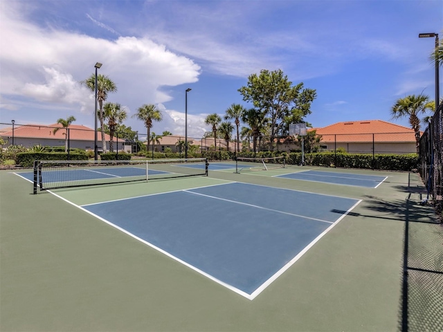 673 Crane Prairie Way, Osprey, FL 34229 - view of tennis court with community basketball court