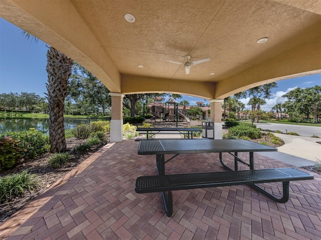 673 Crane Prairie Way, Osprey, FL 34229 - view of patio / terrace featuring ceiling fan and a water view