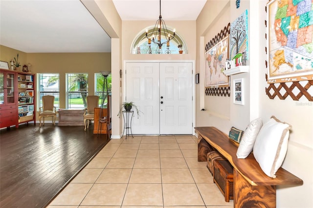 11324 77th St E, Parrish, FL 34219 - entryway featuring a chandelier and baseboards