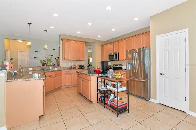 11324 77th St E, Parrish, FL 34219 - kitchen with stainless steel appliances, a peninsula, recessed lighting, light tile patterned floors, and light stone counters