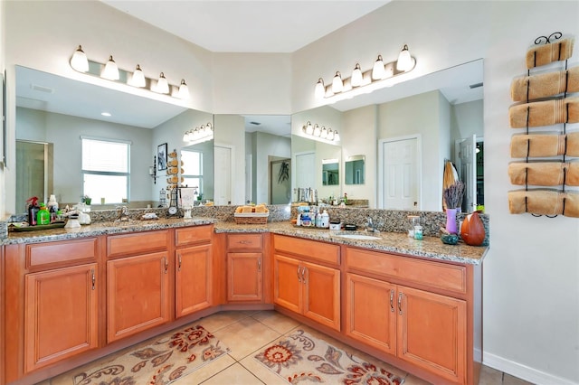 11324 77th St E, Parrish, FL 34219 - full bath featuring double vanity, tile patterned flooring, and a stall shower