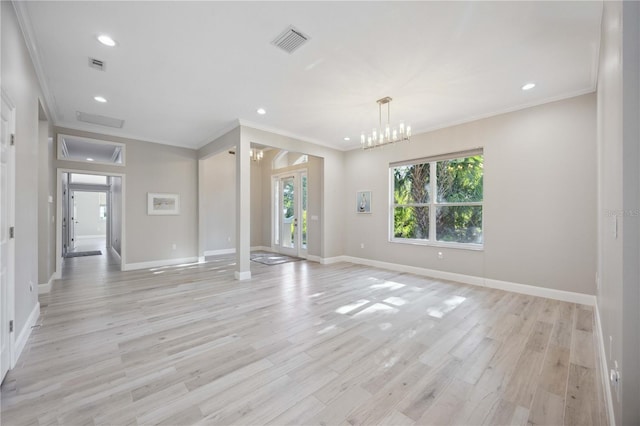 5018 Hanging Moss Ln, Sarasota, FL 34238 - unfurnished living room with ornamental molding, light wood-type flooring, recessed lighting, and a chandelier