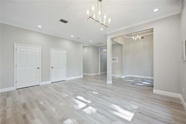 5018 Hanging Moss Ln, Sarasota, FL 34238 - unfurnished living room featuring a chandelier, recessed lighting, light wood finished floors, and ornamental molding
