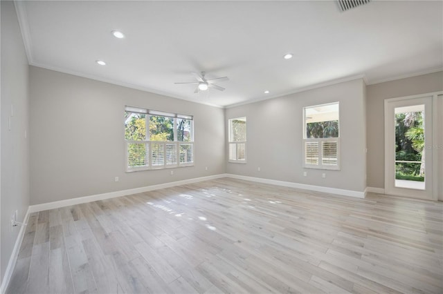 5018 Hanging Moss Ln, Sarasota, FL 34238 - empty room with ornamental molding, plenty of natural light, a ceiling fan, light wood-style floors, and recessed lighting
