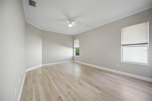 5018 Hanging Moss Ln, Sarasota, FL 34238 - unfurnished room featuring ornamental molding, a ceiling fan, and light wood-style floors