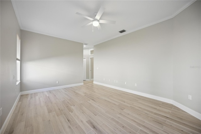 5018 Hanging Moss Ln, Sarasota, FL 34238 - spare room featuring crown molding, a ceiling fan, and light wood-style flooring