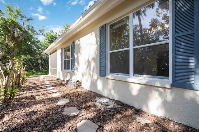 5018 Hanging Moss Ln, Sarasota, FL 34238 - view of side of home with stucco siding