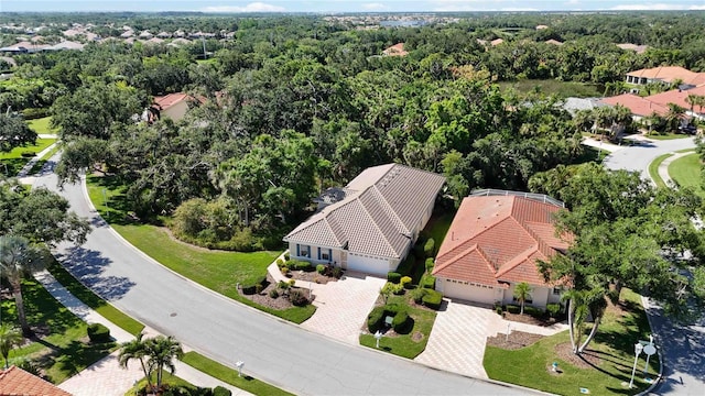 5018 Hanging Moss Ln, Sarasota, FL 34238 - aerial perspective of suburban area featuring a heavily wooded area