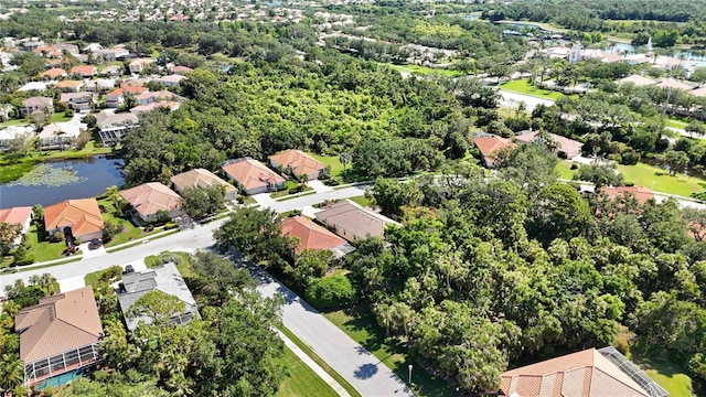 5018 Hanging Moss Ln, Sarasota, FL 34238 - aerial view of residential area featuring a large body of water
