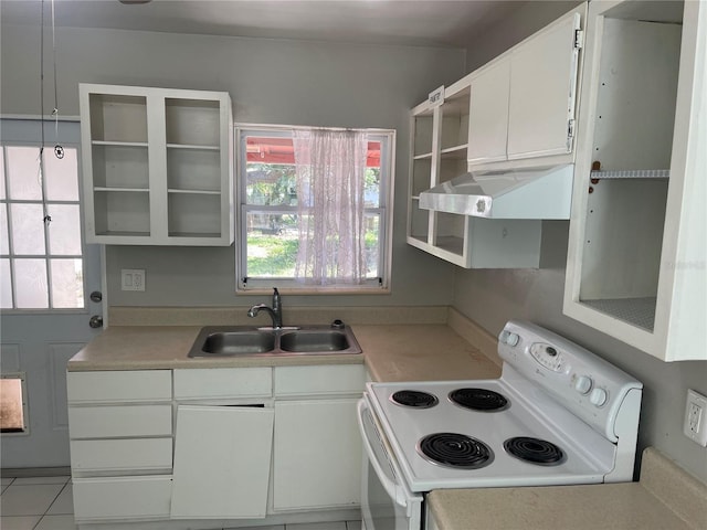 8075 48th Ave N, Saint Petersburg, FL 33709 - kitchen featuring electric stove, open shelves, white cabinets, and light countertops