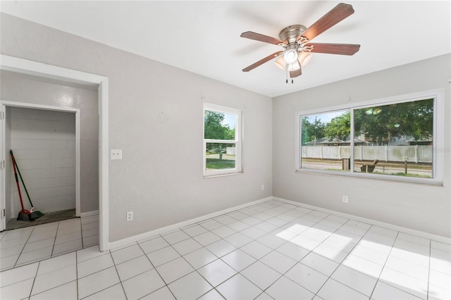 8075 48th Ave N, Saint Petersburg, FL 33709 - spare room featuring ceiling fan and light tile patterned floors