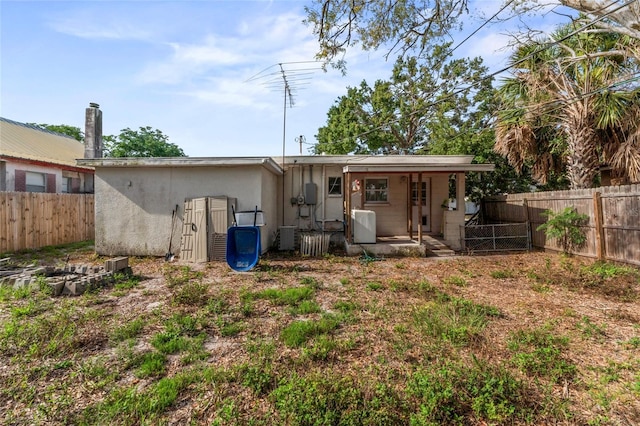 8075 48th Ave N, Saint Petersburg, FL 33709 - back of property with stucco siding