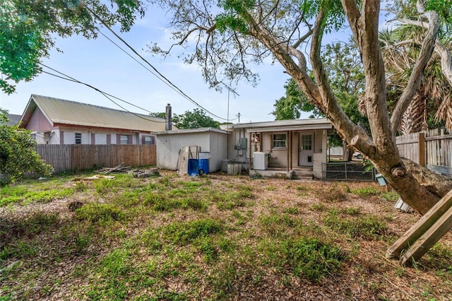 8075 48th Ave N, Saint Petersburg, FL 33709 - back of property featuring covered porch