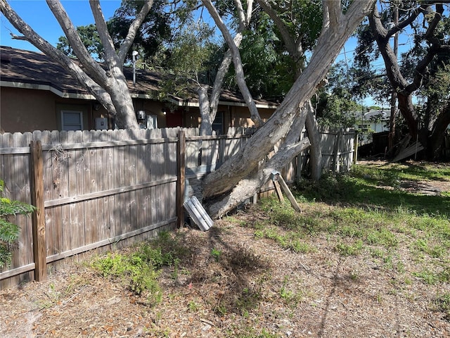 8075 48th Ave N, Saint Petersburg, FL 33709 - view of side of home featuring stucco siding
