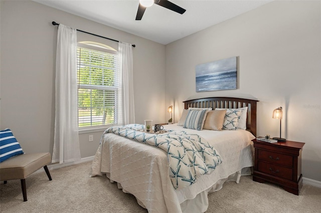 15316 Shady Palms Ln, Nokomis, FL 34275 - carpeted bedroom with baseboards and ceiling fan