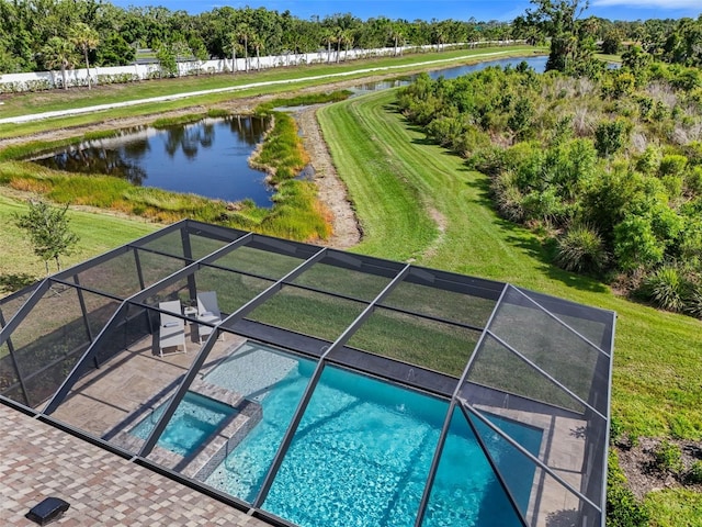 15316 Shady Palms Ln, Nokomis, FL 34275 - view of pool with a water view, a lanai, a patio, and a pool with connected hot tub