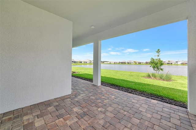 17333 Savory Mist Cir, Bradenton, FL 34211 - view of patio featuring a water view and a residential view
