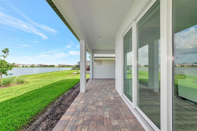17333 Savory Mist Cir, Bradenton, FL 34211 - view of patio / terrace with a water view