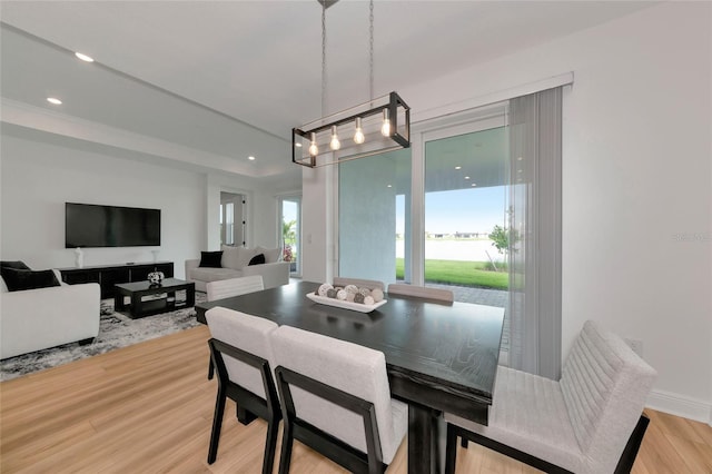 17333 Savory Mist Cir, Bradenton, FL 34211 - dining room with light wood-type flooring and recessed lighting