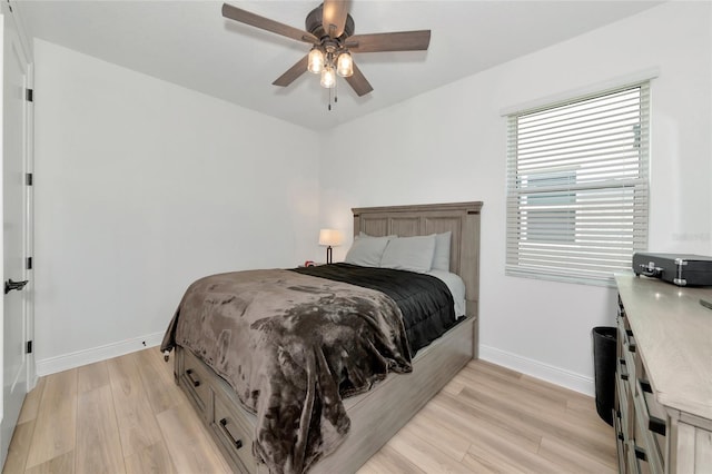 17333 Savory Mist Cir, Bradenton, FL 34211 - bedroom featuring baseboards, light wood finished floors, and ceiling fan