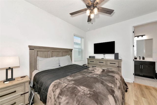 17333 Savory Mist Cir, Bradenton, FL 34211 - bedroom featuring light wood-style floors, connected bathroom, and ceiling fan