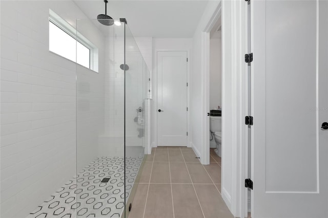17333 Savory Mist Cir, Bradenton, FL 34211 - bathroom with a walk in shower, tile patterned flooring, and toilet